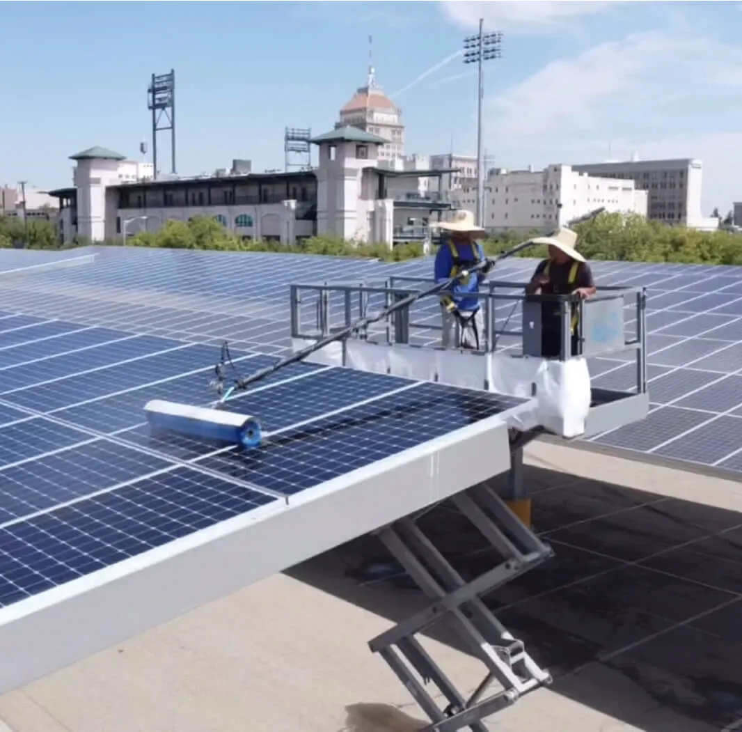 Large commercial solar array being cleaned