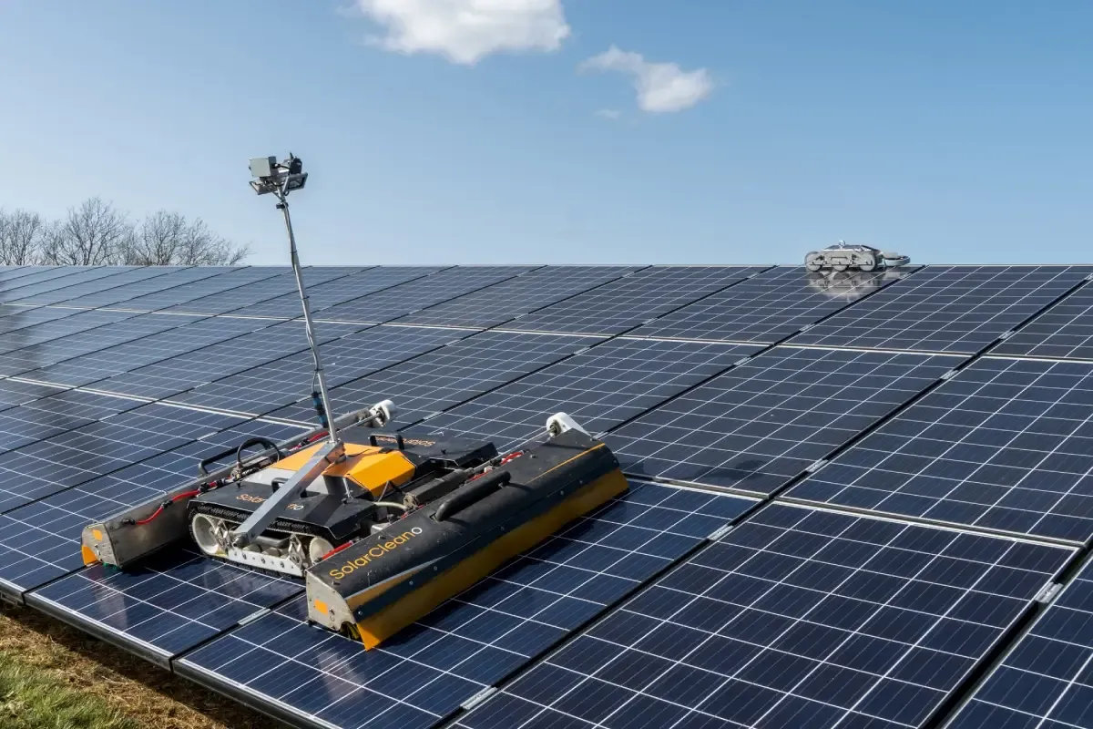 Maximizing Solar Panel Efficiency with Rooftop Cleaning Robots