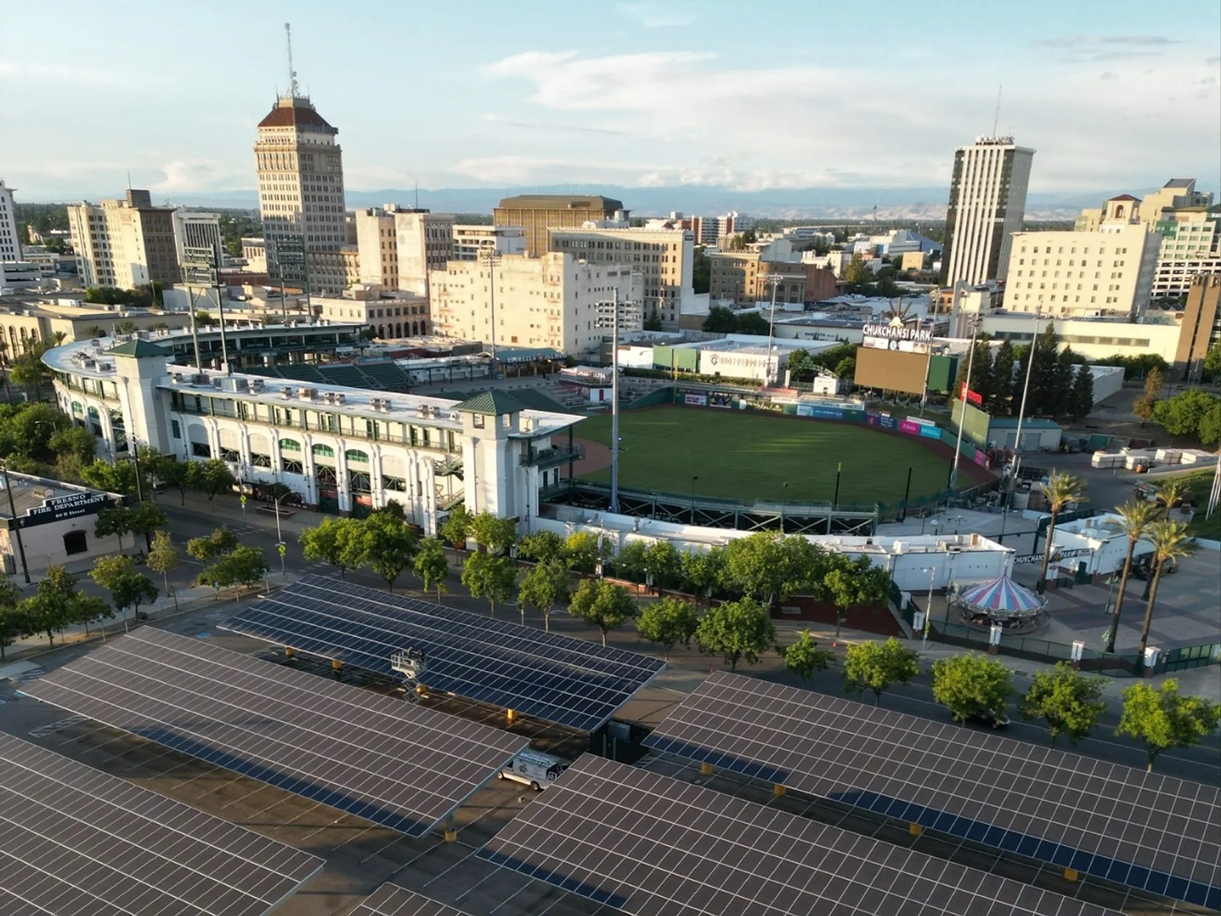Solar panel cleaning at Chukchansi Park in downtown Fresno, CA. Aerial view of the ballpark carport array serviced by Golden Rays